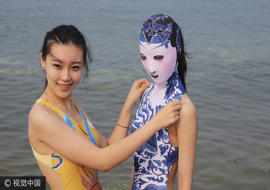 Facekini' beauties attract plenty of attention at the beach 