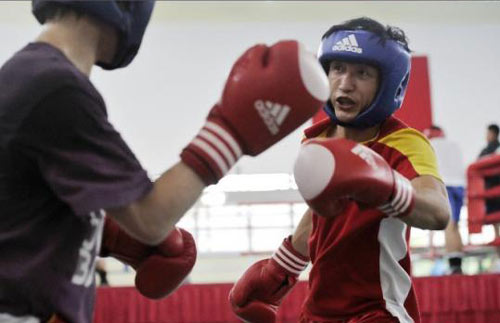 Trailblazer Zou Shiming struck a thunderous blow for China when he won his country's first Olympic boxing gold at the Beijing Games and has again chosen national glory over the lure of professional riches to defend his title in London.