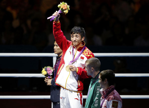 Zou Shiming won his second successive Olympic gold medal on Saturday, beating Thailand's Kaeo Pongprayoon in a battle of two of the oldest fighters.