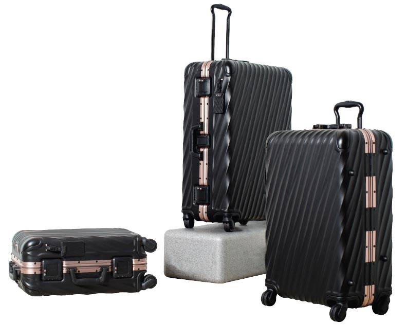 tumi black and gold luggage