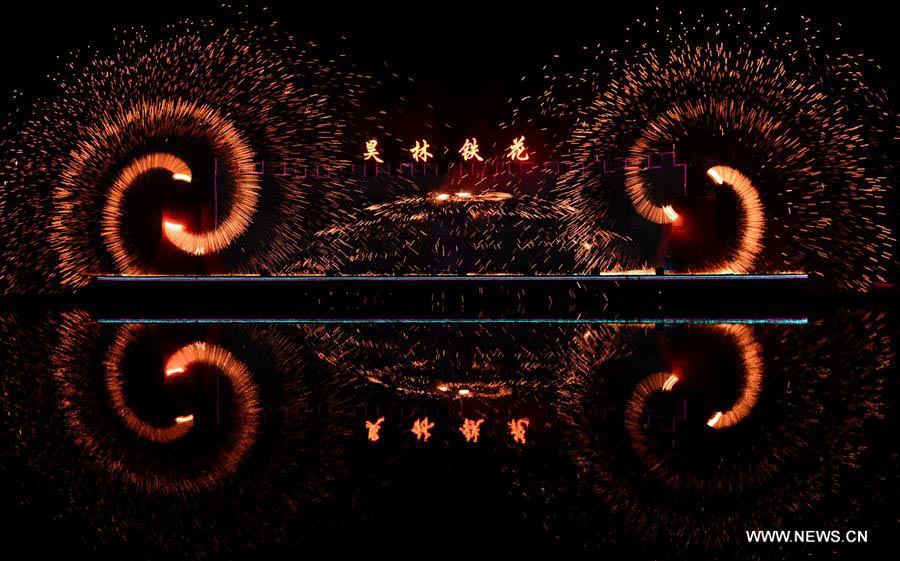 molten iron fireworks show performed to greet chinese new year