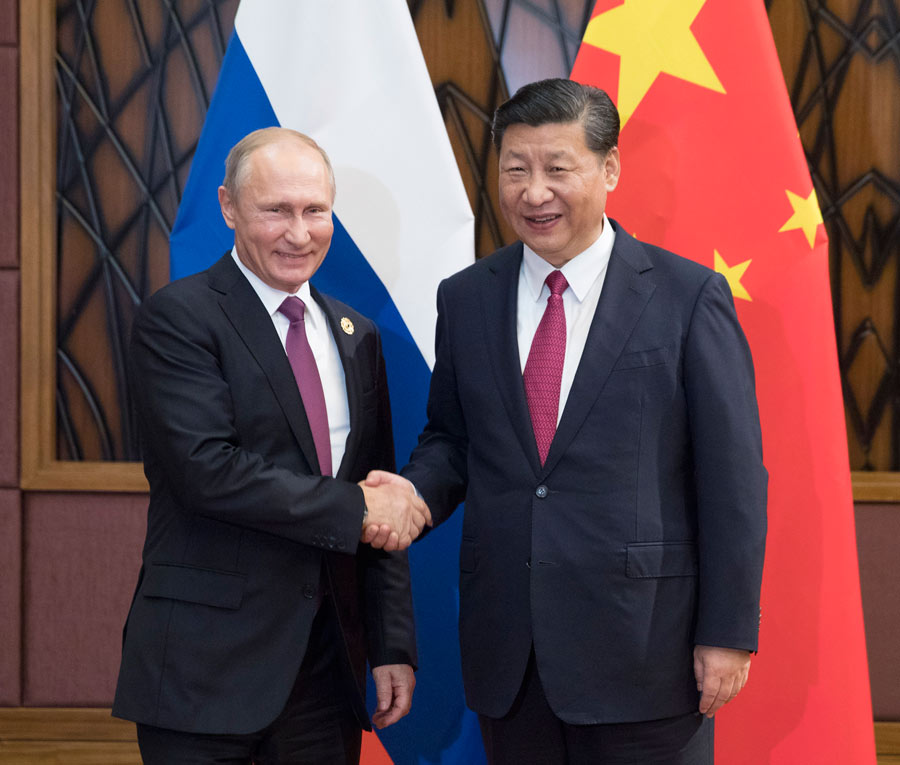 Putin hails Xi as his reliable partner