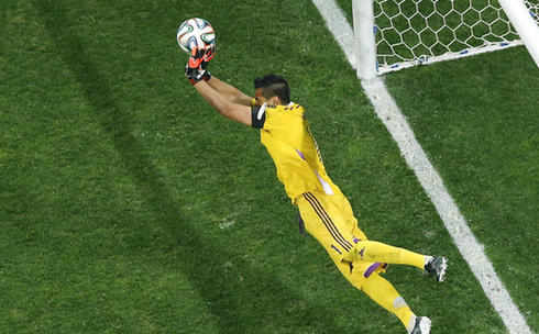 Argentina's goalkeeper Sergio Romero saves a penalty kick by the Netherlands' Wesley Sneijder during the World Cup semifinal soccer match between the Netherlands and Argentina at the Itaquerao Stadium in Sao Paulo, Brazil, Wednesday, July 9, 2014. Argentina beat the Netherlands 4-2 in a penalty shootout to reach the World Cup final against Germany. (AP Photo/Fabrizio Bensch, Pool)