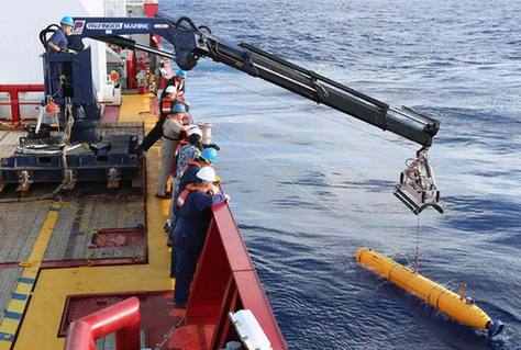 Malaysia jet search area too deep for submarine