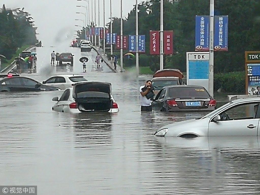 14,000 evacuated as heavy rain lashes northeast china city