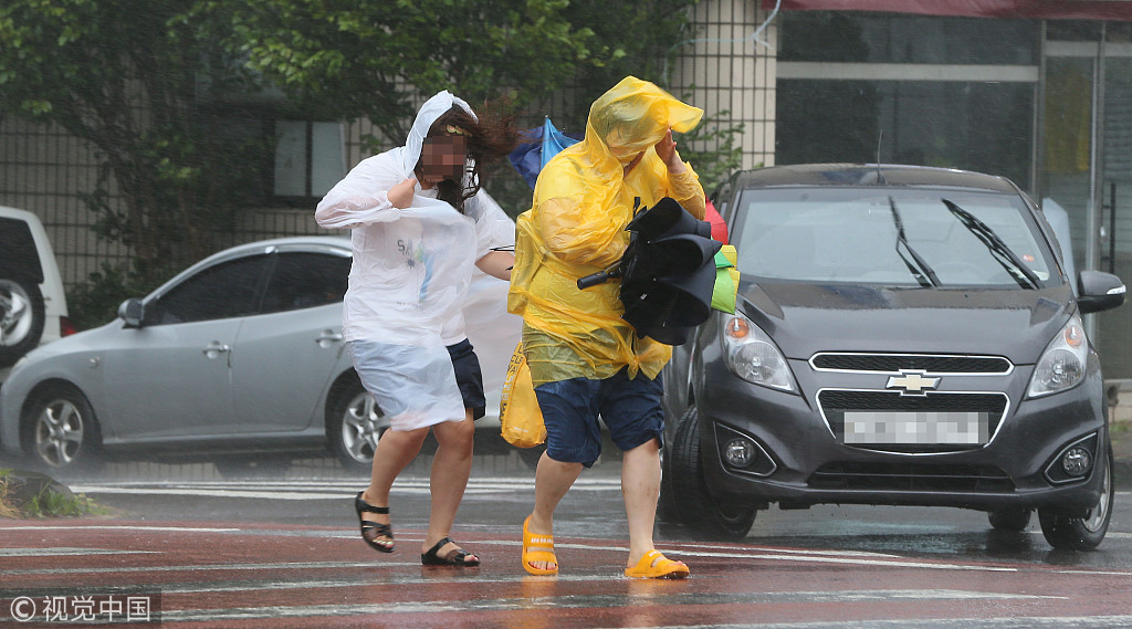 2 typhoons weaken after pounding south korea and