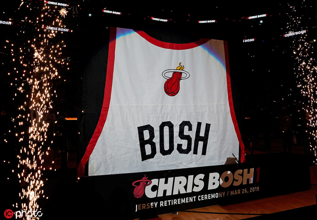 Miami Heat retired jersey numbers hang in the rafters at Kaseya News  Photo - Getty Images