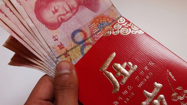 The red envelope or hong bao is used for giving money during