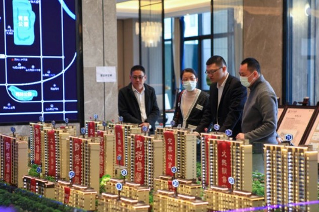 China vows consistent financial policy to curb housing speculation