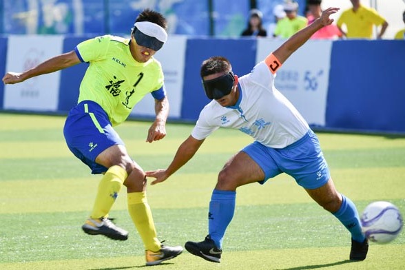 Soccer players kick out visual impairment stereotypes