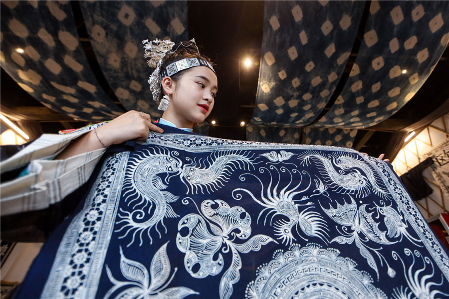 Young Woman Aspires to Invigorate Miao Batik