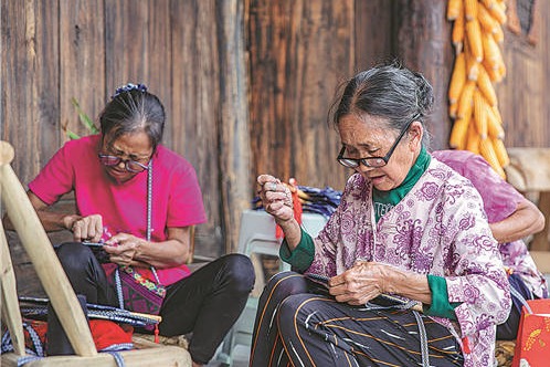 Love for embroidery has Miao villagers in stitches