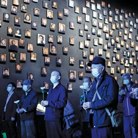 Inheritors pledge to honor memory of Nanjing Massacre - Chinadaily.com.cn