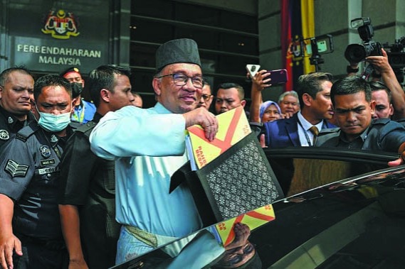 马来西亚预算为较不富裕的人提供税收减免-世界