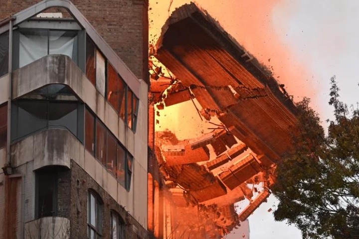 Building collapsing, people evacuated in massive building fire in Australia's Sydney