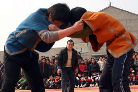 Villagers wrestle for 'sheep holder' honor as ancient test continues