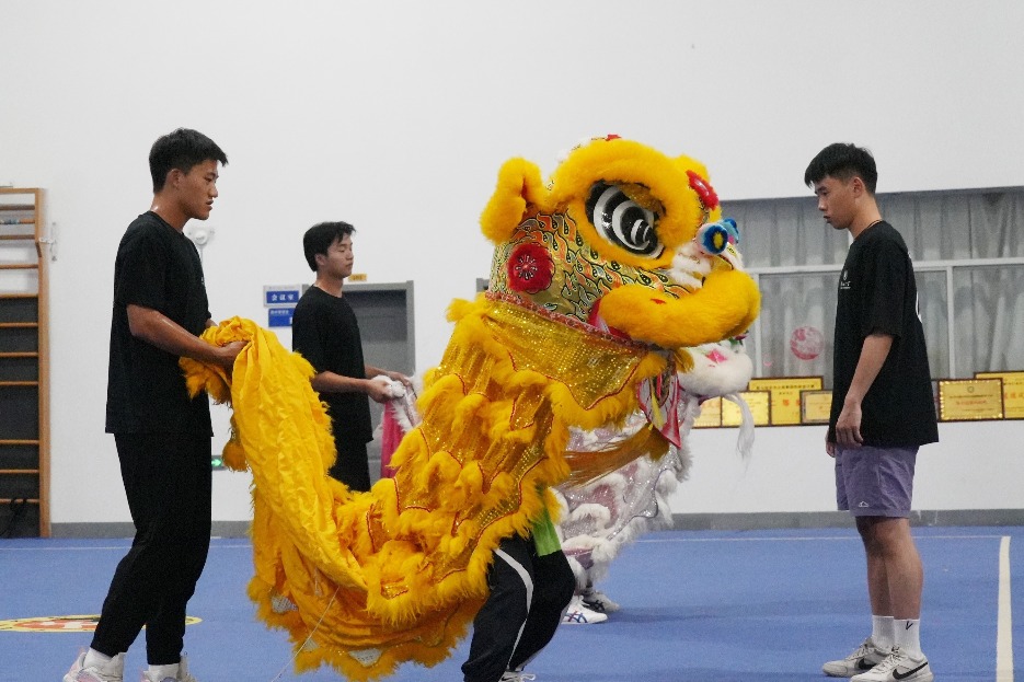 Students demonstrate their enthusiasm through lion dance