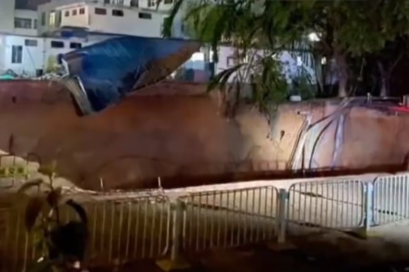 13 missing in construction site ground collapse