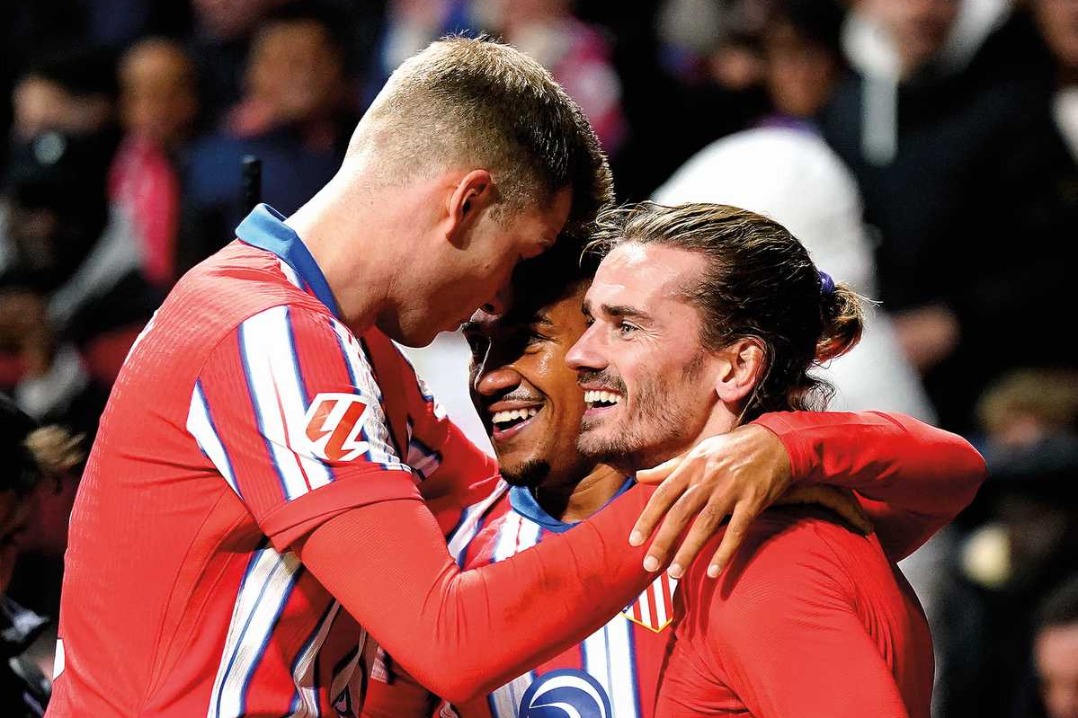 Griezmann seals superb Atletico comeback in Sevilla thriller