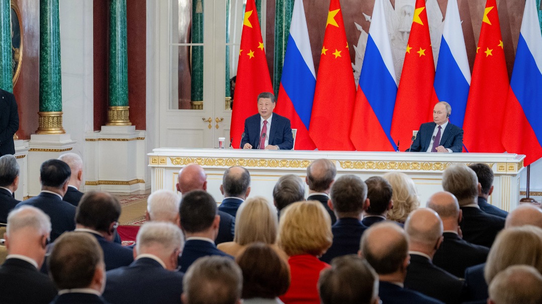 Xi, Putin meet press