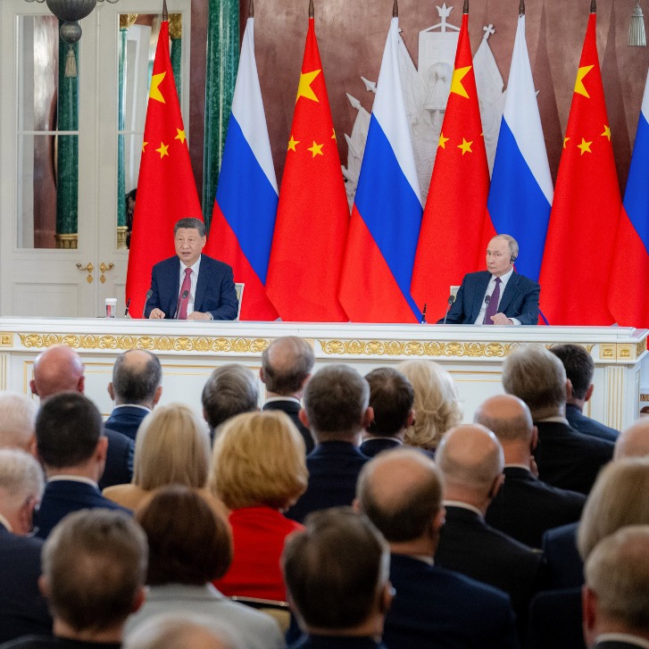 Xi, Putin meet press
