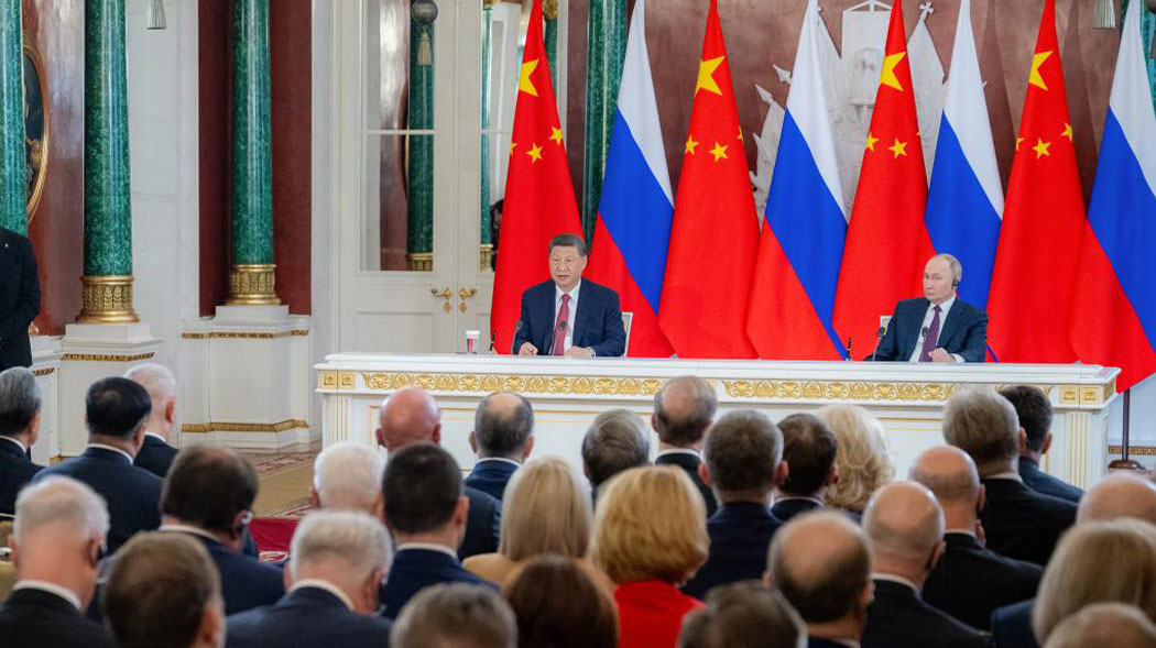 Xi, Putin meet press