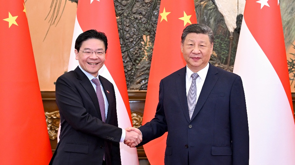 Xi meets Singaporean PM