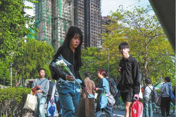 Hong Kong mourns those killed in tower fire tragedy