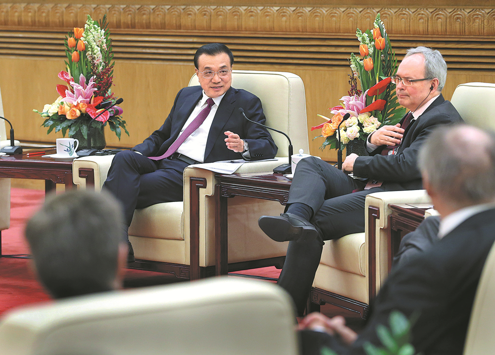 Li praises foreigners for help in opening