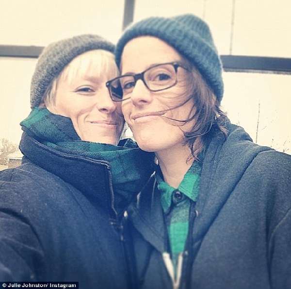 Megan Rapinoe (left) has been dating singer songwriter Sera Cahoone (right) for just over a year 