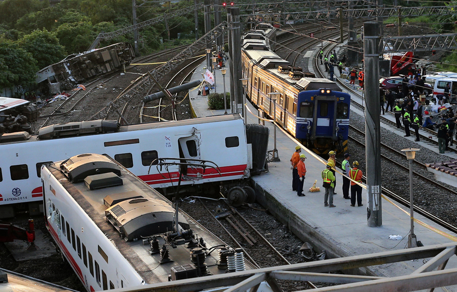 Authorities seek answers after train derails in Taiwan