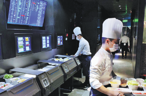 Robots serving up savory food at artificial intelligence eateries