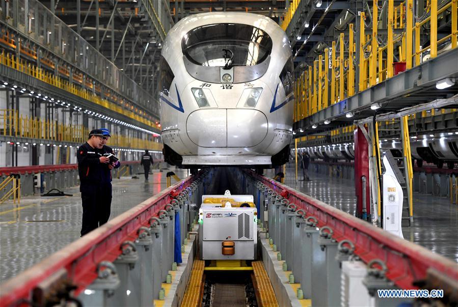 Robots employed in China's railway system during Spring Festival travel rush