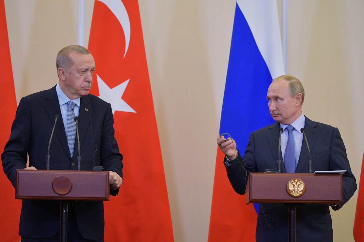 Russia, Turkey adopt memorandum on northern Syria situation after Putin ...