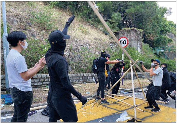 HK govt urges protesters: Come out and surrender