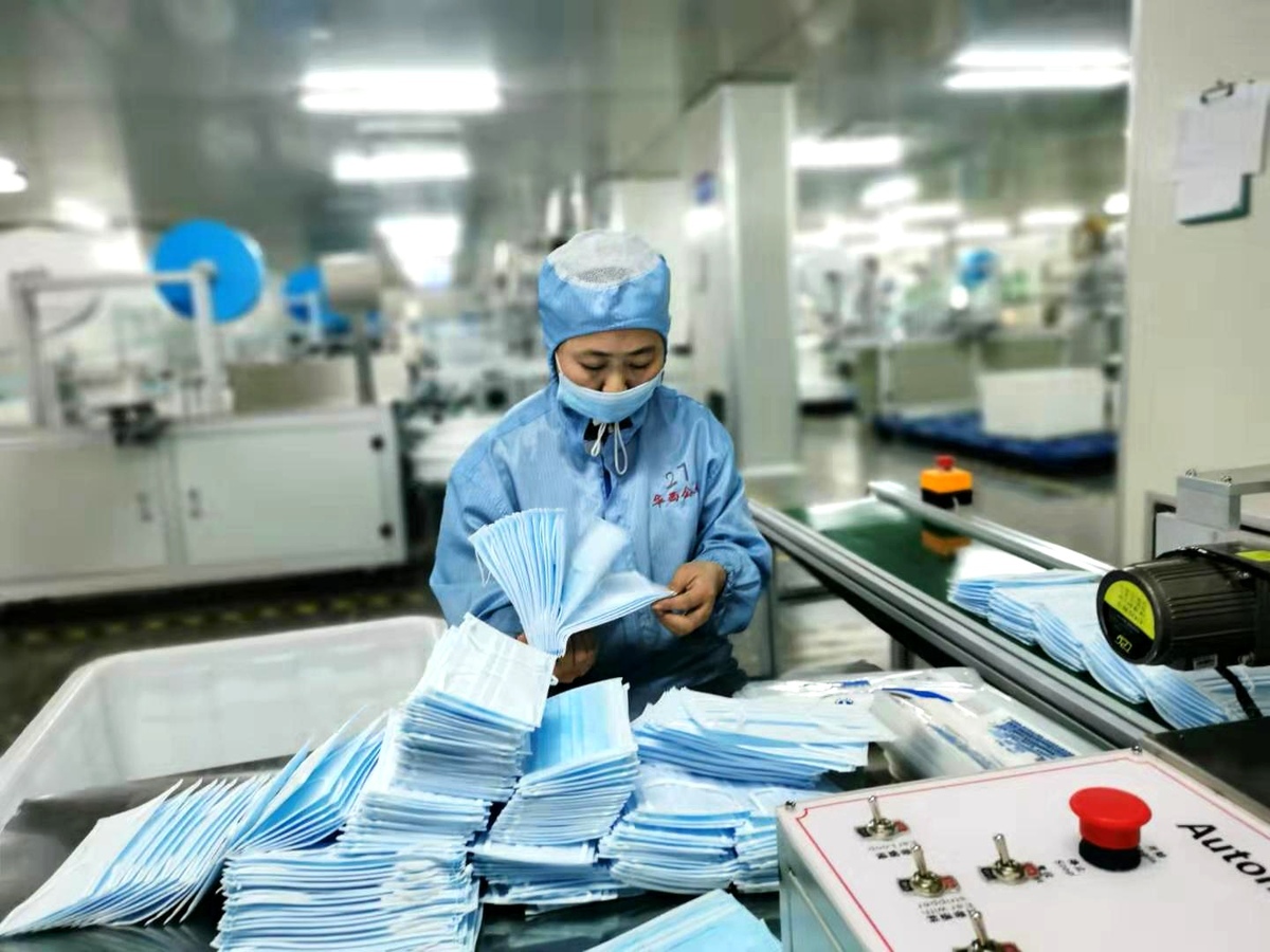 face-mask-production-remains-strong-amid-other-factory-slowdowns-chinadaily-cn