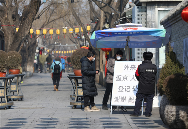 Beijing imposes new quarantine rule for returnees