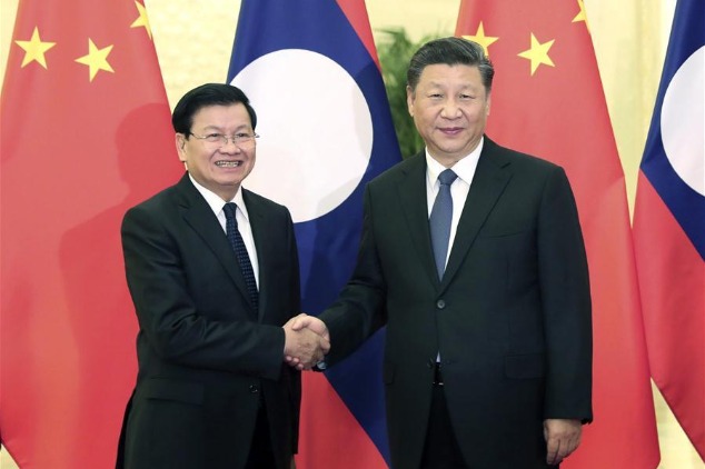 Xi hails Thongloun role as general secretary in Laos - Chinadaily.com.cn