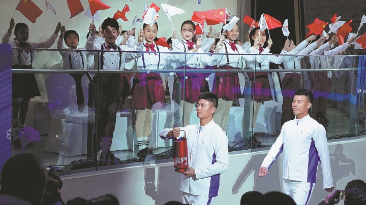 Olympic flame's arrival sparks 2022 Winter Games - Vimarsana News