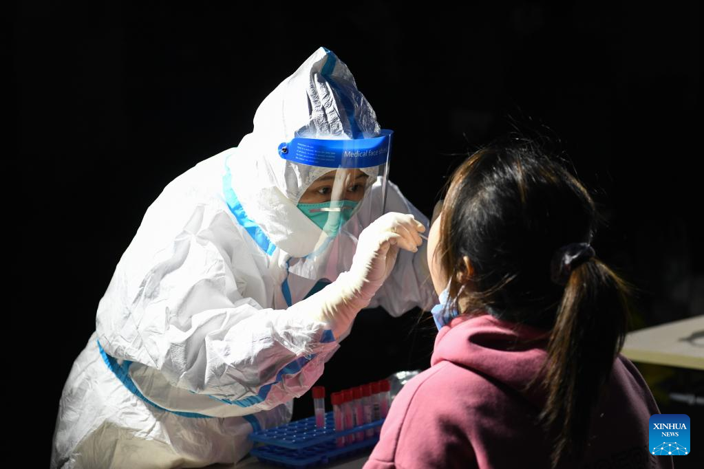 Infected woman identified in Zhuhai