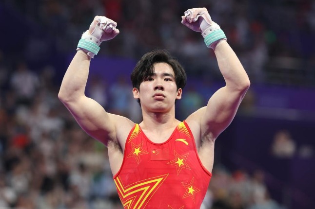 China's Zhang Boheng wins men's all-around gymnastics title at Asiad ...