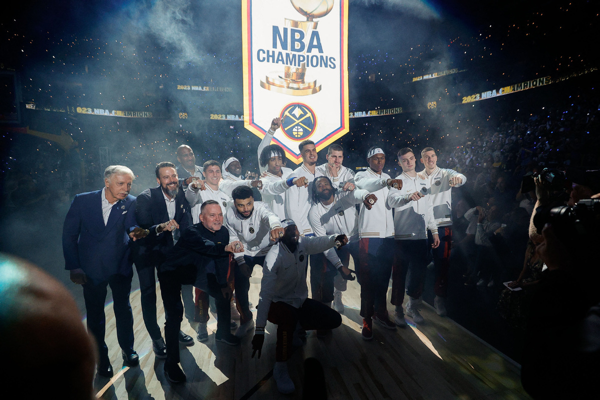 Denver Nuggets receive championship rings, raise banner