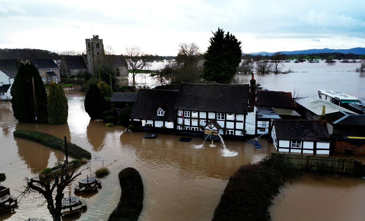 Flood Warnings And Transport Chaos In UK After Storm Henk - Chinadaily ...