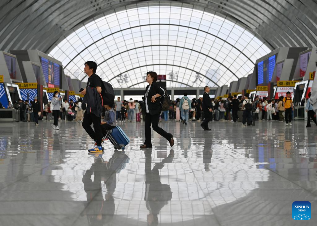 China expects 18.65m railway trips on last day of May Day holiday