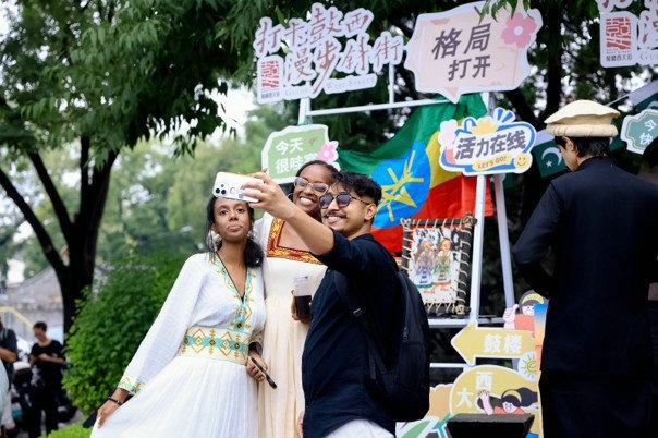 Beijing's historical street welcomes young global storytellers