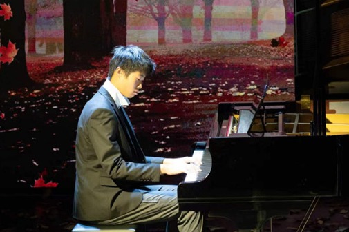 Shanghai student combines music, technology with community service
