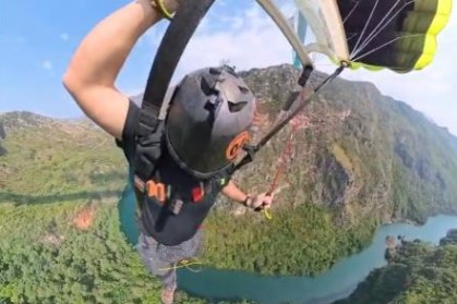 BASE jumpers leap from Huajiang Grand Canyon Bridge in Guizhou